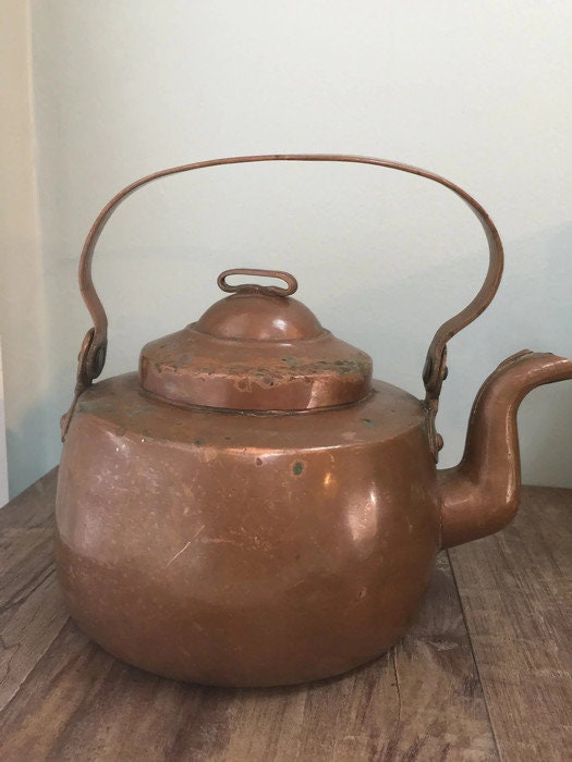 Antique copper tea kettle